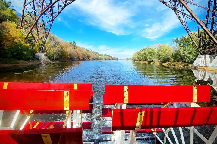 a train crossing a bridge over a river