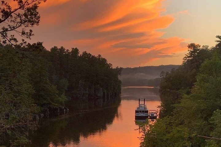a sunset over a body of water