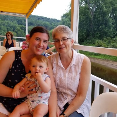 a woman sitting on a bench