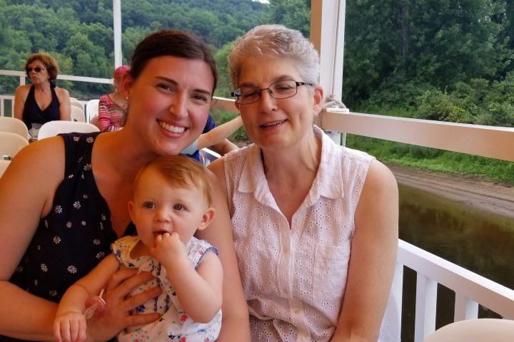 a woman sitting on a bench