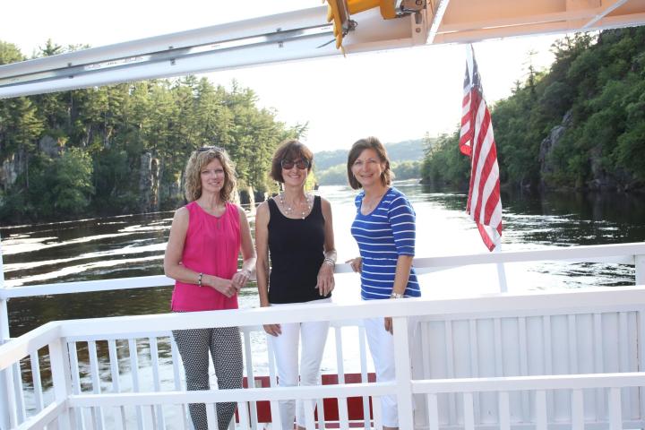 a person standing in front of a fence