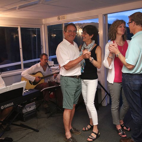a group of people standing in a room