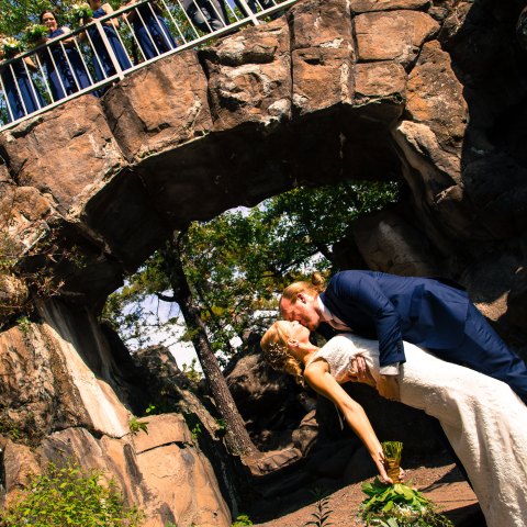 a man sitting on a rock