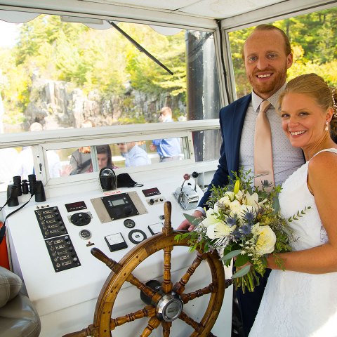 Elizabeth Dickinson et al. standing in front of a window