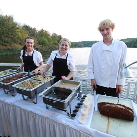 a group of people sitting at a table