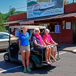 a man and a woman sitting on a street