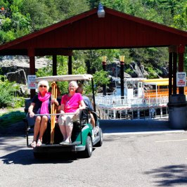 a person riding a skateboard up the side of a road