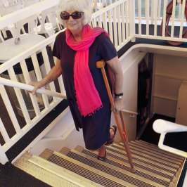 a person standing in front of a fence