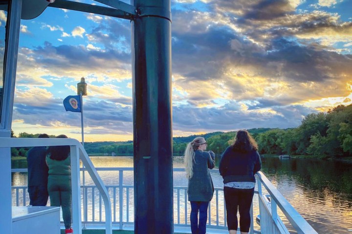 a person standing in front of a body of water