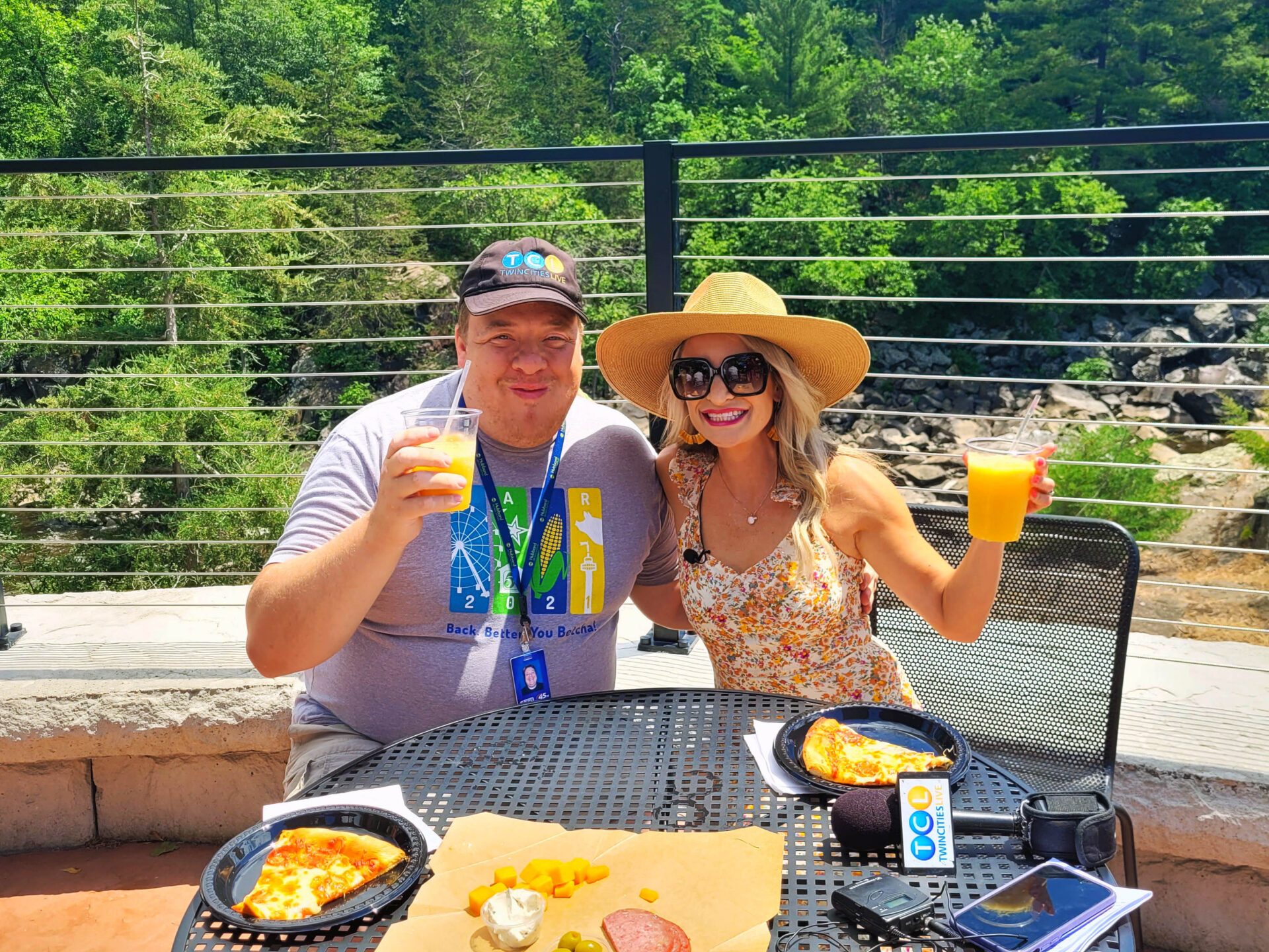 a person sitting at a picnic table