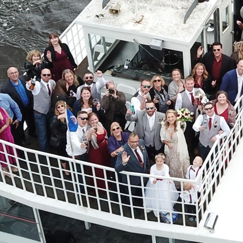 a group of people standing in front of a crowd