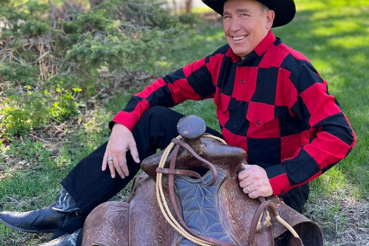 a man riding on the back of an elephant