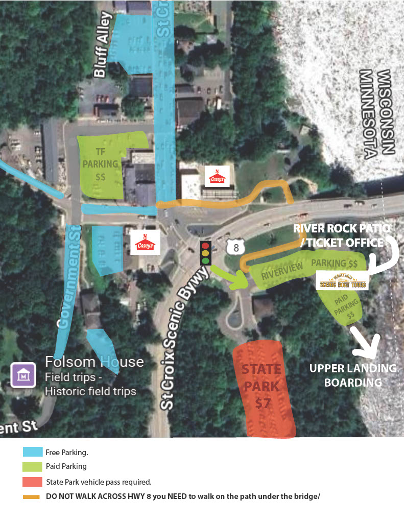 Aerial map with roads, parking areas, and landmarks near a river and state park.